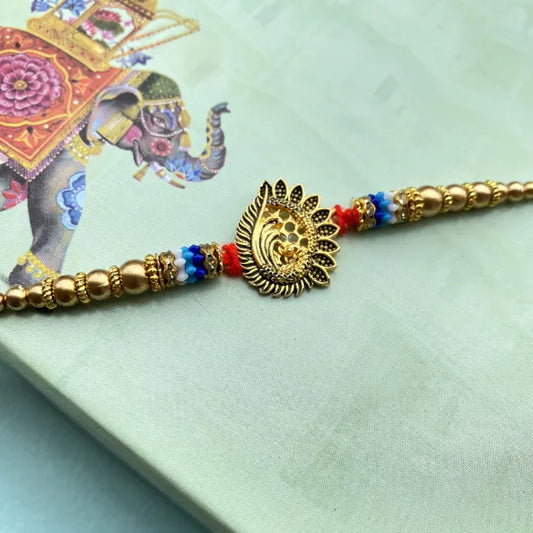 Beautiful metal peacock Rakhi