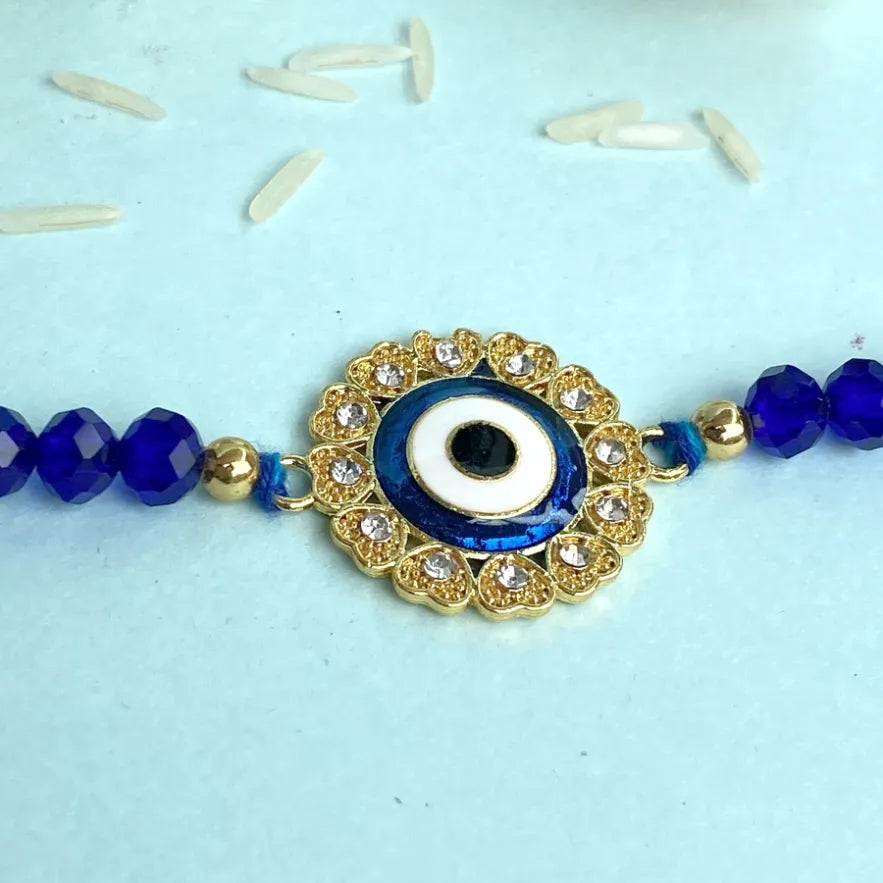 Evil Eye Rakhi with Blue Stone and Diamonds